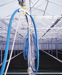 Media- and energy supply for mobile watering car in a greenhouse
